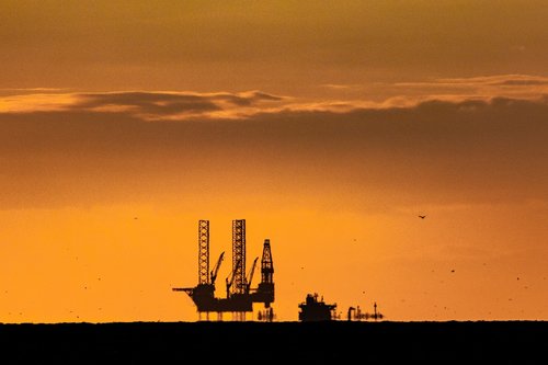 sunset  oil rig  north sea