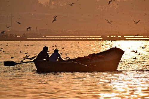 sunset  river  boat