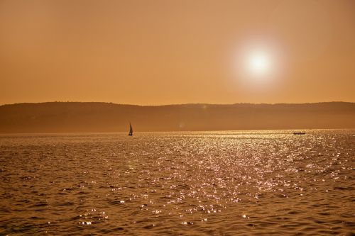 sunset lake constance water