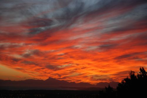 sunset mountains clouds