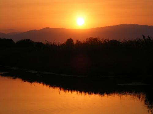 sunset sun water
