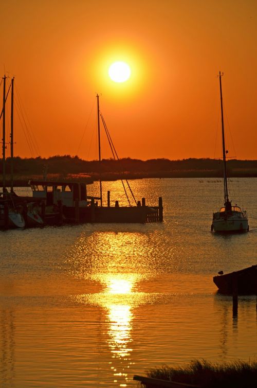 sunset sea ships