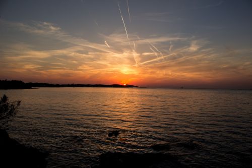 sunset sea island