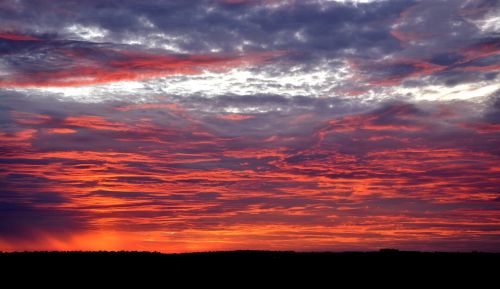 sunset against light clouds in the sun