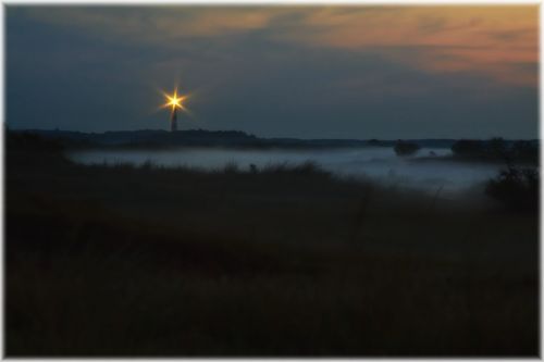 sunset fog lighthouse