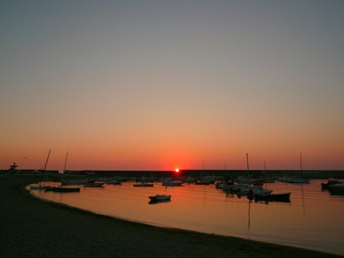 sunset harbor boats