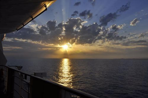 sunset ship sea