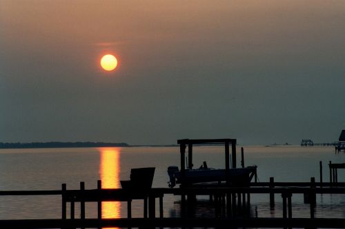 sunset boat ocean