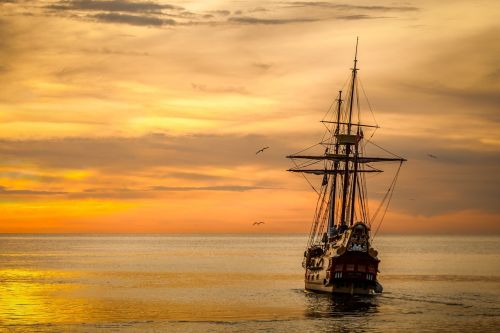 sunset boat sea ship