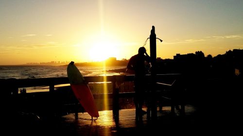 sunset surfer male