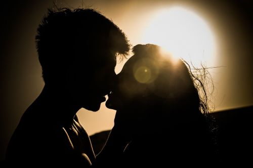 sunset kiss couple