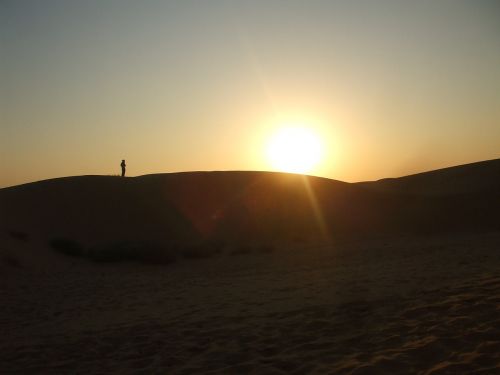 sunset desert sand