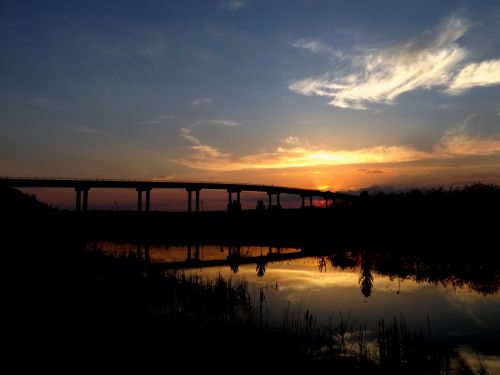 sunset bridge sun