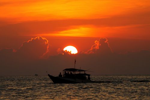 sunset sea clouds