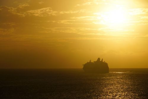 sunset sea ship