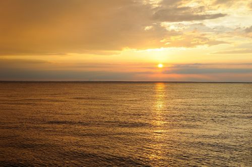 sunset sea reflection