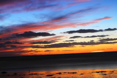 sunset sea clouds