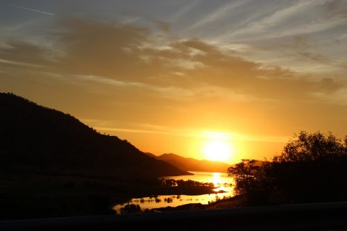 sunset mountains lake