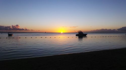 sunset boat water