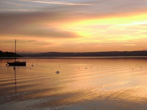 sunset water boat