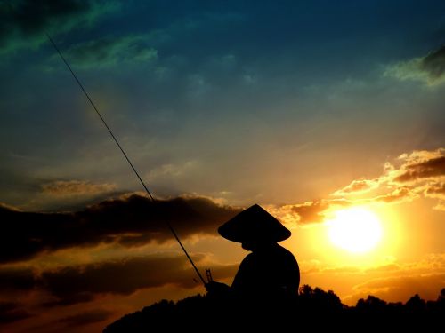 sunset fisherman sun