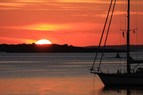 sunset sailing vessel sea