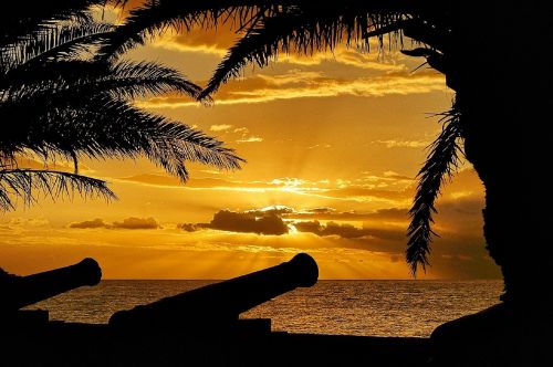 sunset crepuscular rays ocean