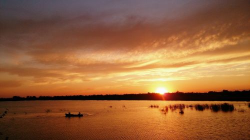 sunset orange water