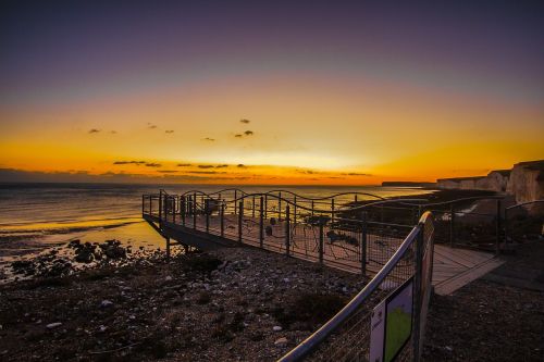 sunset ocean coast