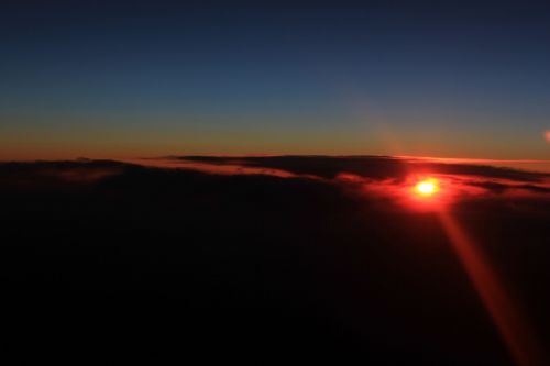 Sunset Above The Clouds