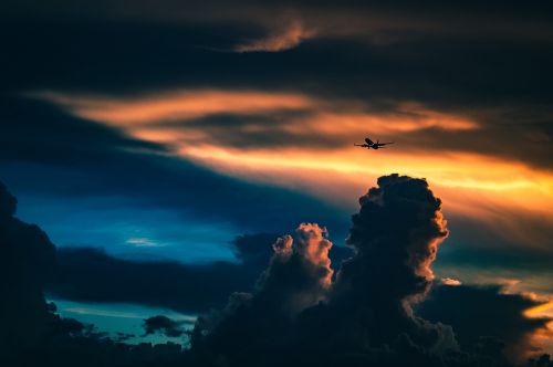 sunset clouds airplane travel sunset