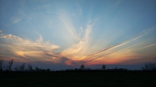 sunset glow  sunset  landscape