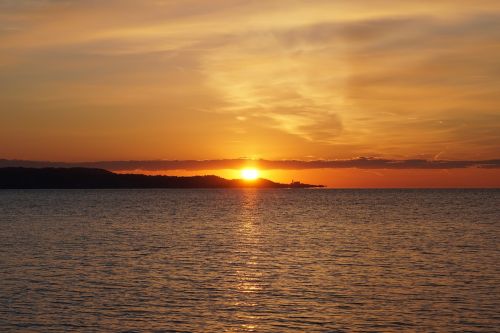 sunset sea clouds evening sky