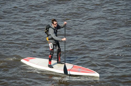 surf board rafting man