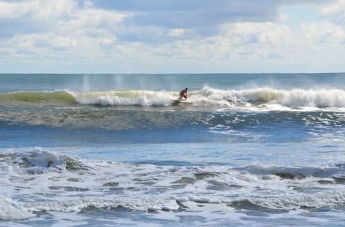 Surf Boarder Riding The Waves