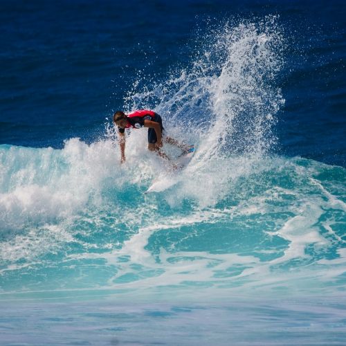 surfer waves surfing