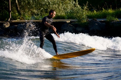 surfer river surfing surfboard