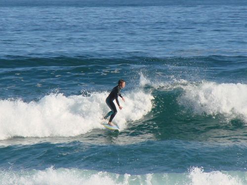 surfer young ocean