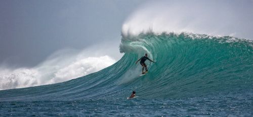 surfer big waves skillfully