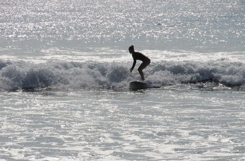 surfer  surfboard  surfing