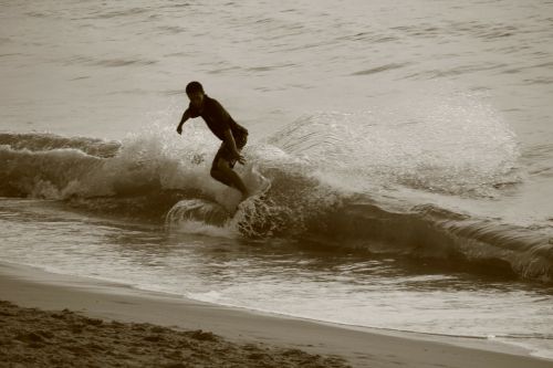 surfer wave beach