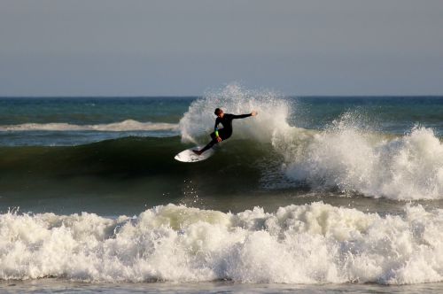 surfer surfboard sea