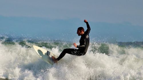 surfer surfboard water sports