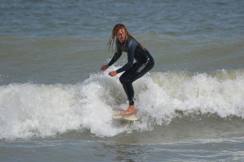 surfer waves man