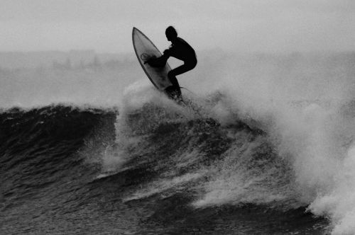 surfer surfing wave