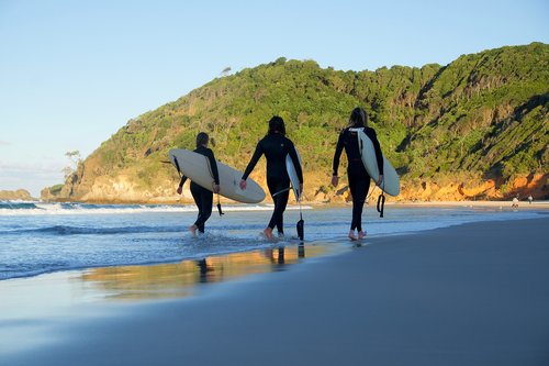 surfers  surf  beach