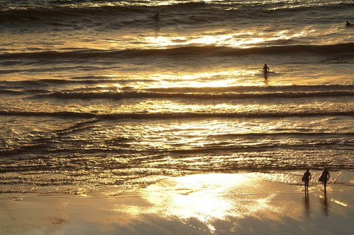 surfers  beach  reflection