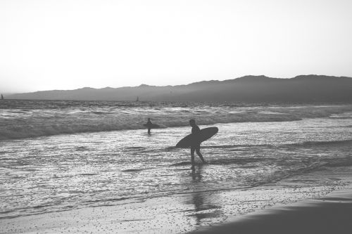 surfing beach surfboard