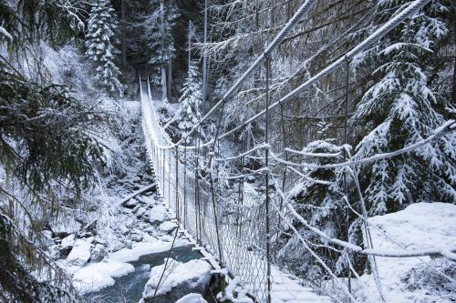 suspension bridge winter frozen