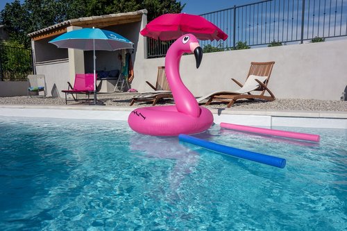swimming pool  parasol  pink